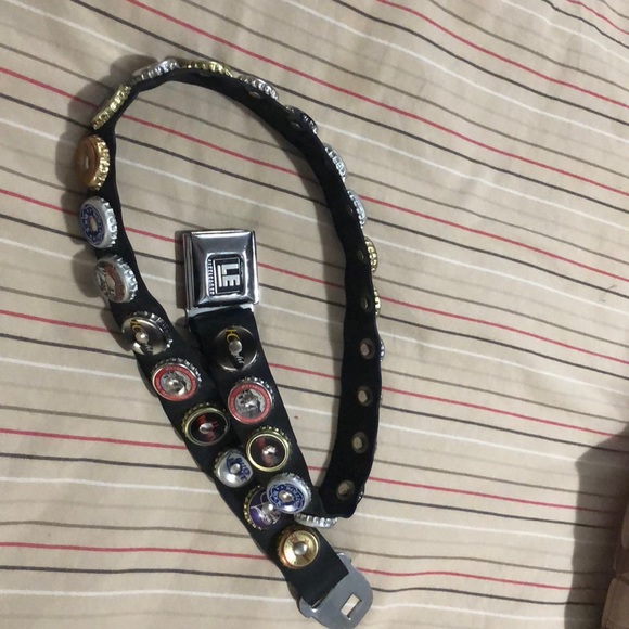 Accessories - Seat belt beer bottle cap belt.